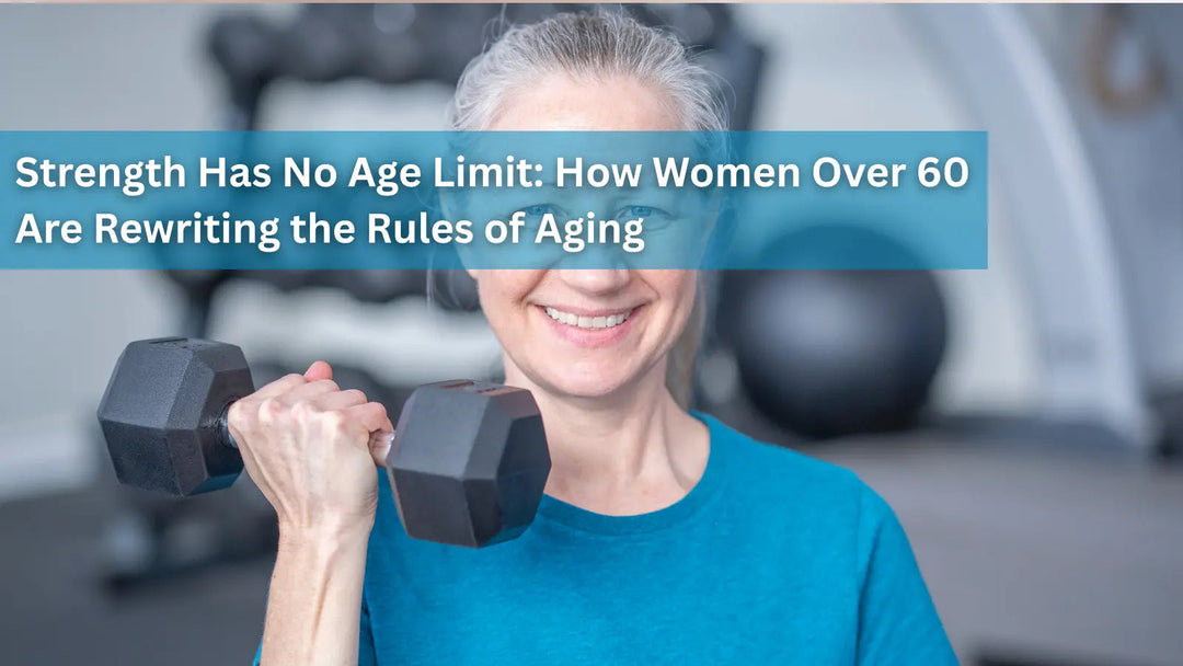 A smiling older woman with grey hair lifting a black dumbbell in a gym setting.