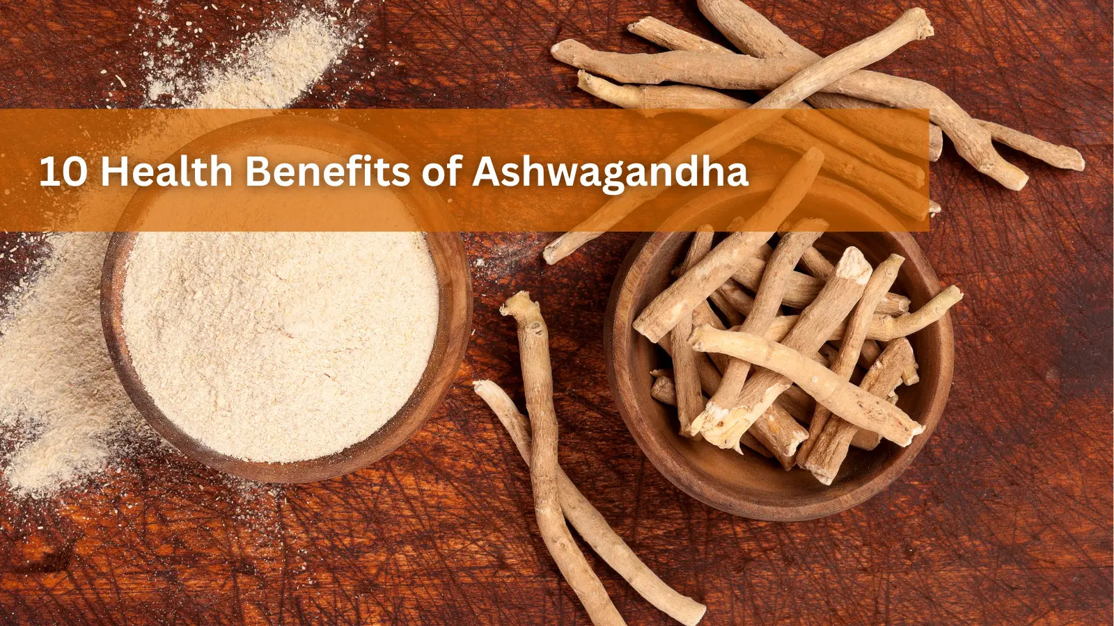 Overhead shot of Ashwagandha roots and powder in wooden bowls on a brown wooden background.