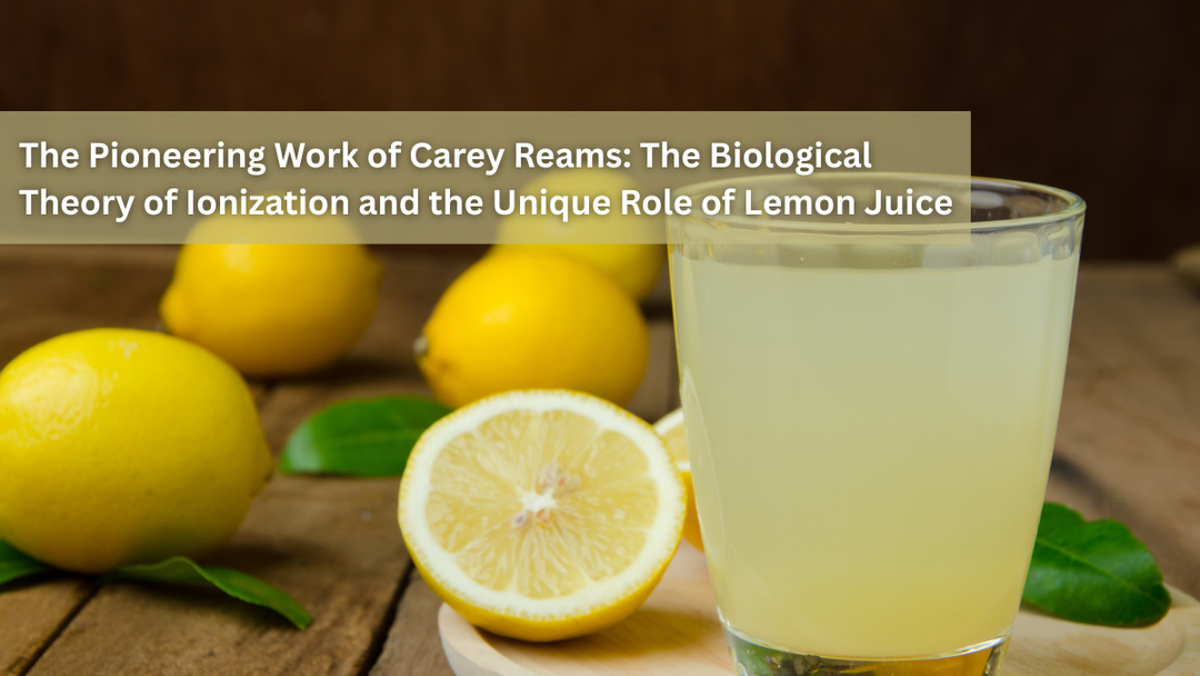 Fresh lemons and a glass of lemon juice.