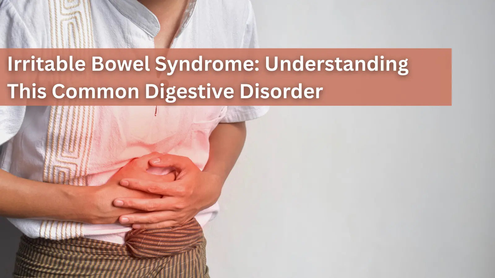 This image shows a person holding their stomach with both hands, where a red glow indicates pain or discomfort. The text discusses understanding Irritable Bowel Syndrome (IBS).