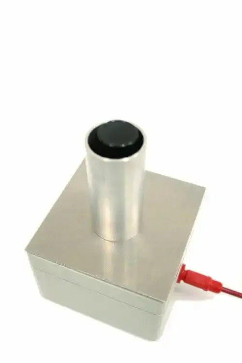 Water sample inside aluminum shield to make a homeographic bottle copy (sample bottle and plate not included) 