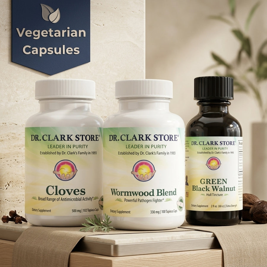 Person holding tincture and tapioca capsules for parasite cleanse bottle.